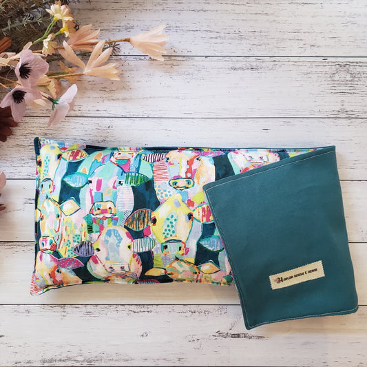 heat pack with colourful cows design
